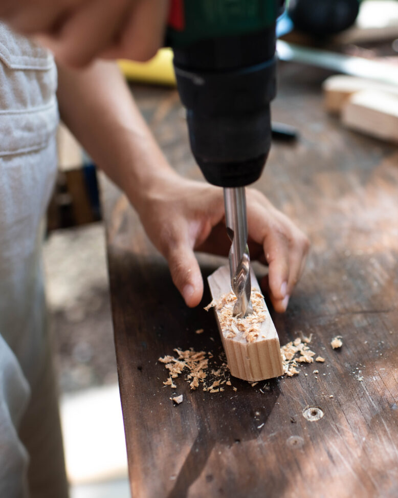 Drilling the holes in the wall hanger