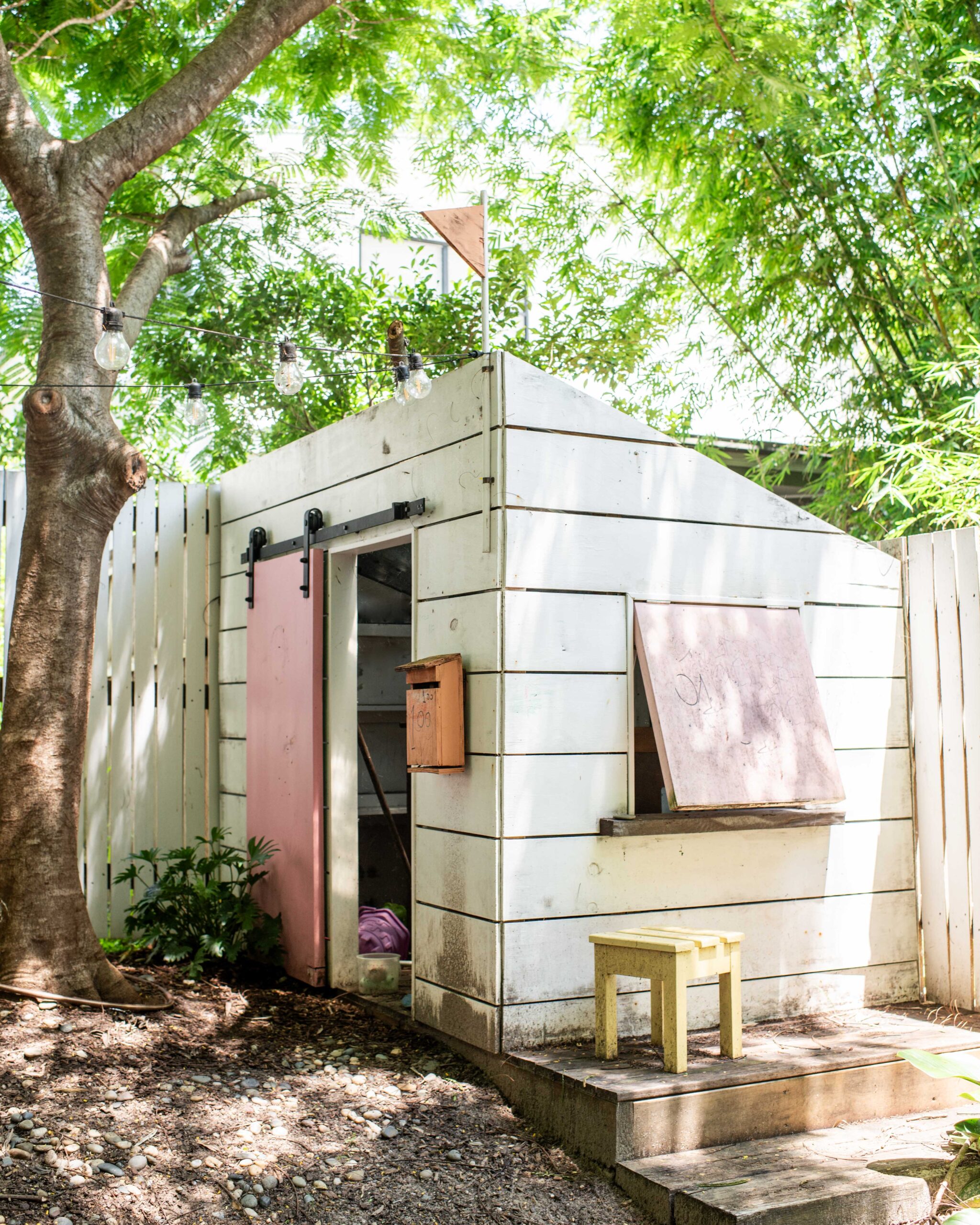 We Made a Kid's Backyard Art Studio (With A Flower Mural!)