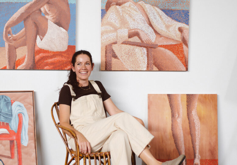 Laura Lois in her studio, wearing Collective Gen overalls