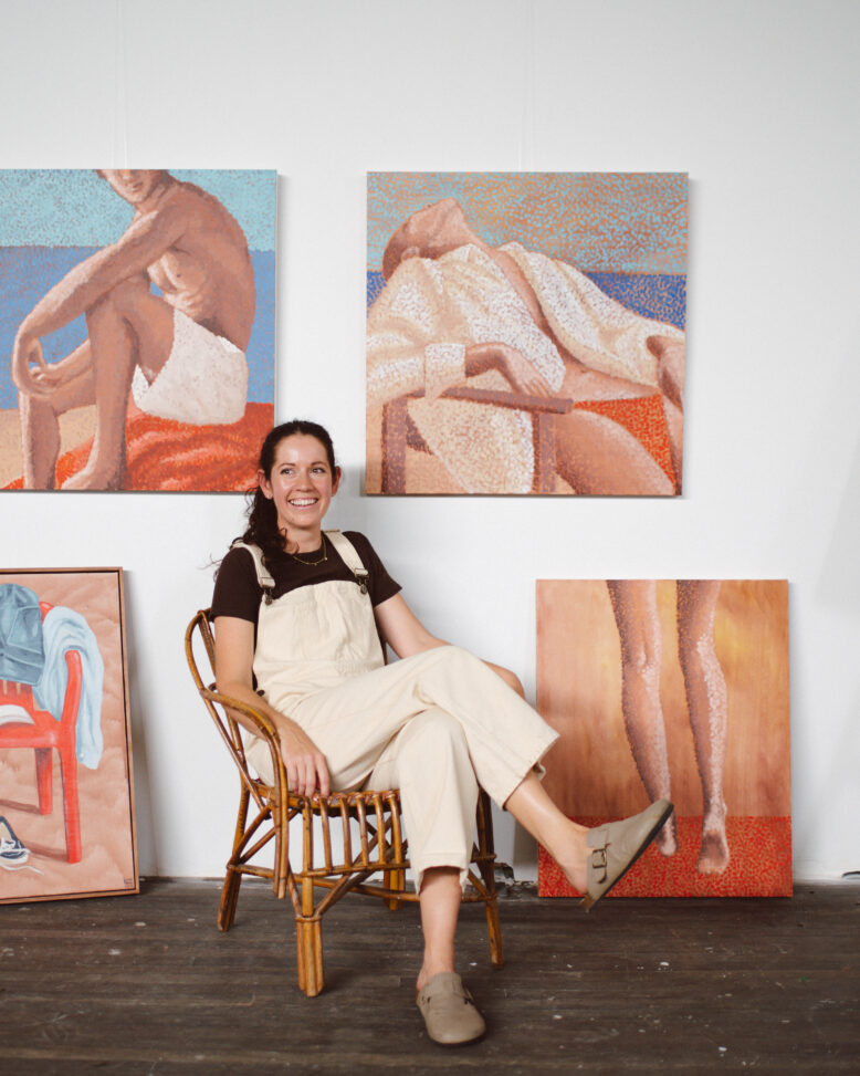 Laura Lois in her studio, wearing Collective Gen overalls
